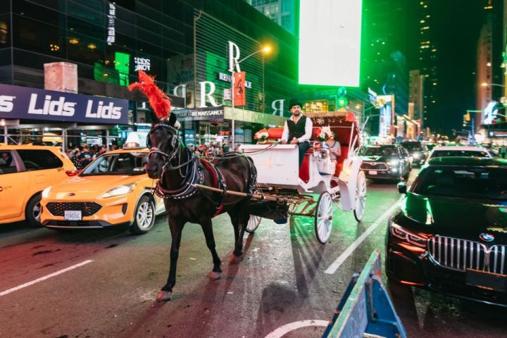a car driving down a busy city street