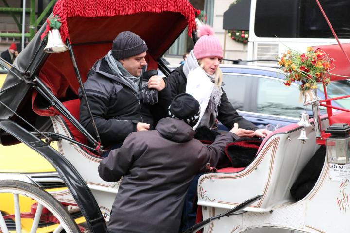 A couple in a carriage
