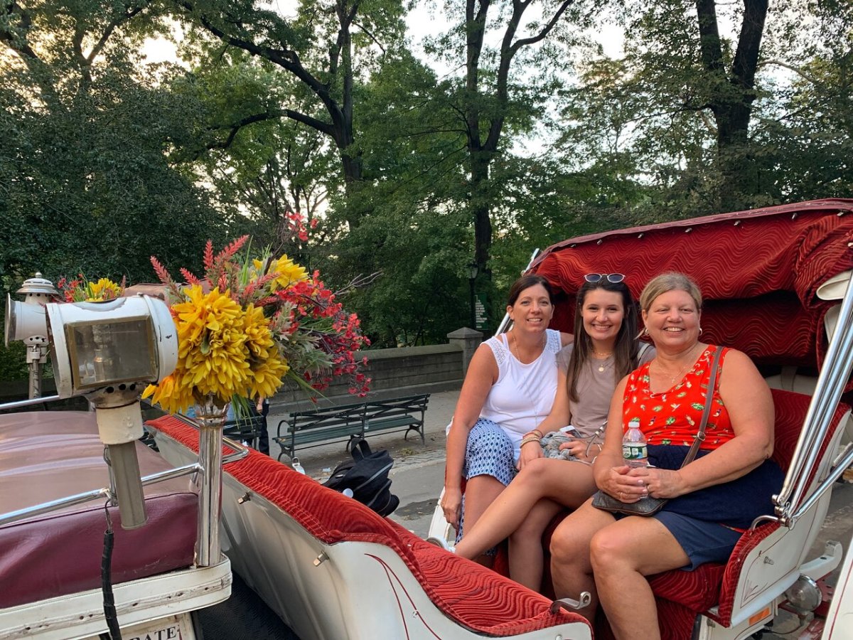 a man and a woman sitting on a bench