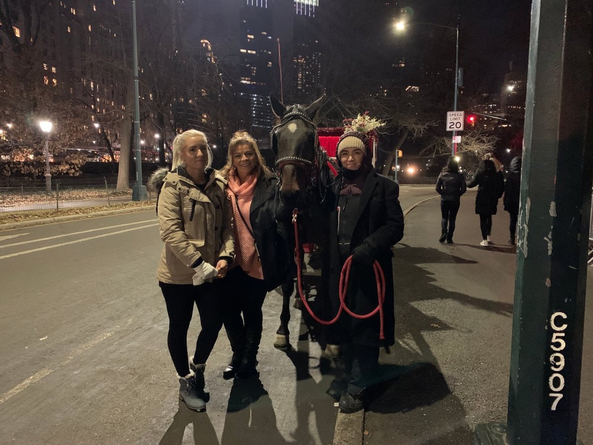 a group of people walking down the street