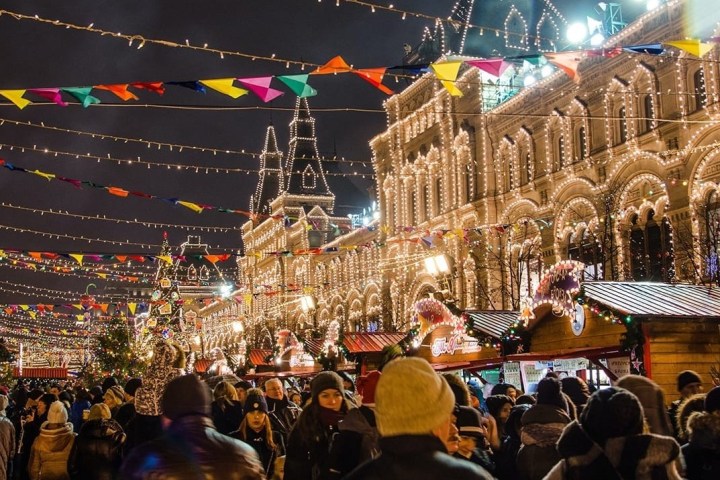 a group of people performing on stage in front of a crowd