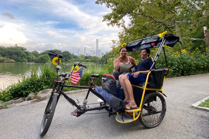 a bicycle parked on the side of a road